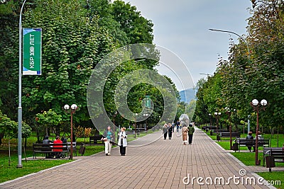 Pedestrian alley in Atazhukinsky Park in Nalchik Editorial Stock Photo