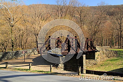 A pedestrian bridge leads visitors to Virginius Island Stock Photo