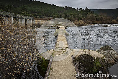 Pedestrian bridge over Zezere river at Barroca Village Stock Photo