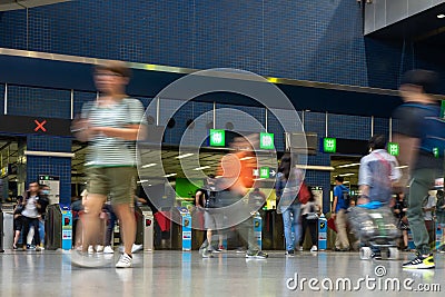 Pedestrian Commuter Crowd Busy Train Station People Travelling at Subway station ticket hall in Hong Kong Editorial Stock Photo