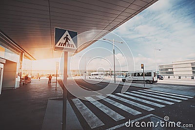 Pedestrian crossing next to airport entrance Stock Photo