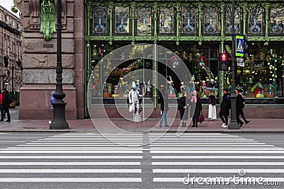 Pedestrian crossing and street performers Eliseyev Emporium of St. Petersburg Editorial Stock Photo