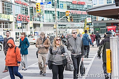 Pedestrians crossing a busy intersection Editorial Stock Photo