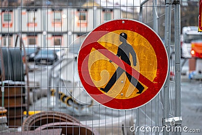 Pedestrians prohibited sign by road works.. Stock Photo