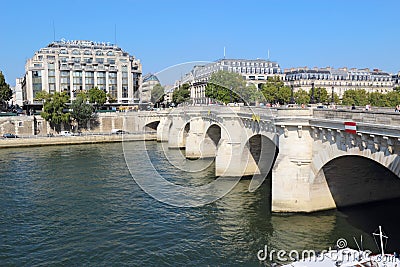 Pedestrians and traffic on the Pont Neuf in Paris, France Editorial Stock Photo