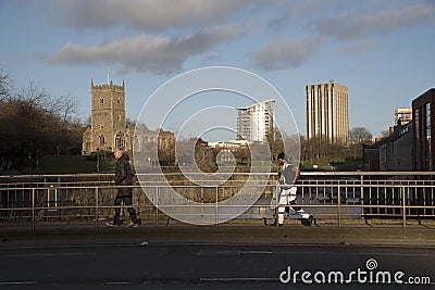 Pedestrians walking over bridge. Bristol England UK Editorial Stock Photo