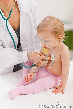 Pediatric doctor examine baby Stock Photo