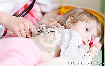 Pediatric doctor examining little baby girl Stock Photo