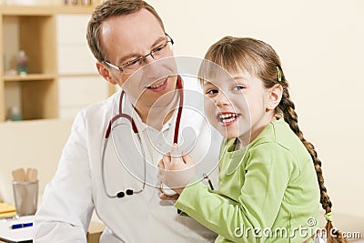 Pediatrician doctor with child patient Stock Photo