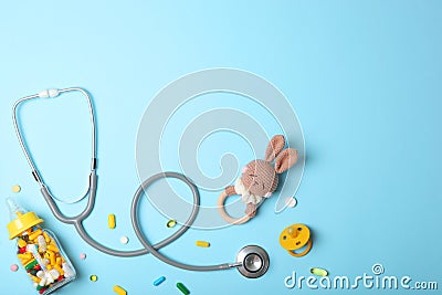 Pediatrics concept. Stethoscope and toy on a light background Stock Photo