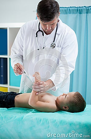 Pediatrist measure the temperature Stock Photo