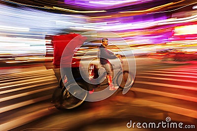 Pedicab in Manhattan, NYC, in motion blur Editorial Stock Photo