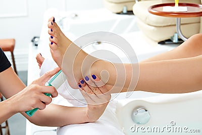 Pedicure dead skin remover feet care woman Stock Photo