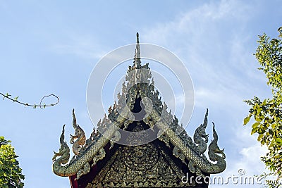 Pediment above hall at Wat Phra Kaew, Chiang Rai, Thailand Stock Photo