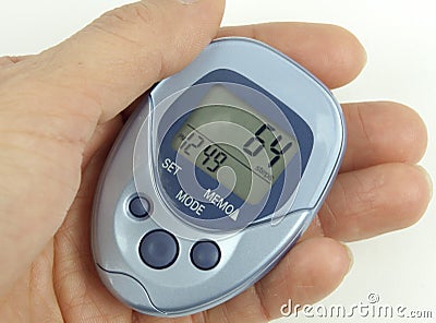 Pedometer In Hand Stock Photo