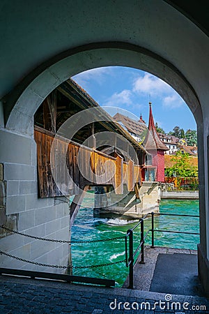 Peeking through a portal to view the Mill Bridge of Lake Lucerne Stock Photo