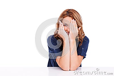 Peeking, woman and shy in studio for secret, surprise or hiding face on white background on mock up space. Person, girl Stock Photo