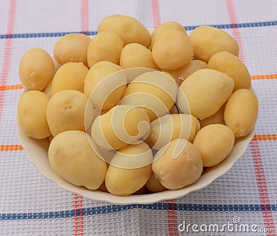 Peeled boiled tasty potatoes in the kitchen Stock Photo
