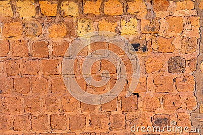 Peeled brick wall, clay brick and old texture Stock Photo