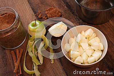 Peeled and diced fresh apple with cinnamon Stock Photo