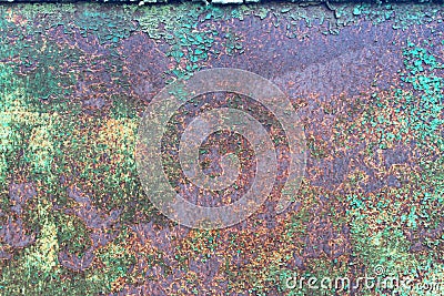 Peeled green paint on purple rusty metal with rust for background Stock Photo
