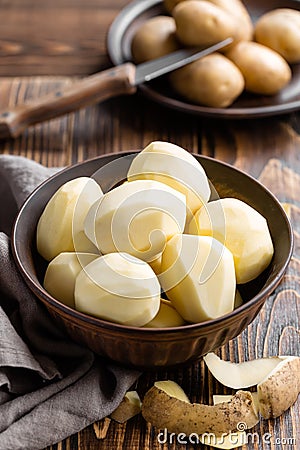 Peeled potatoes Stock Photo