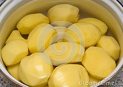 Peeled potatoes Stock Photo