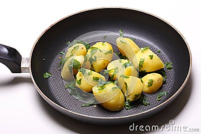 Peeled potatoes in pan Stock Photo