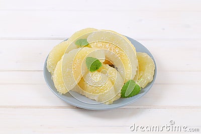 Peeled and sliced pomelo Stock Photo