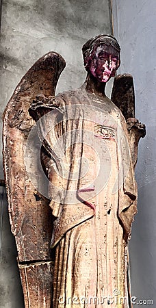 Peeling angel face sculpture Stock Photo