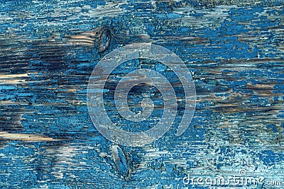 Peeling blue paint on an ancient wooden door Stock Photo