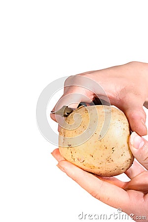 Peeling potatoes Stock Photo