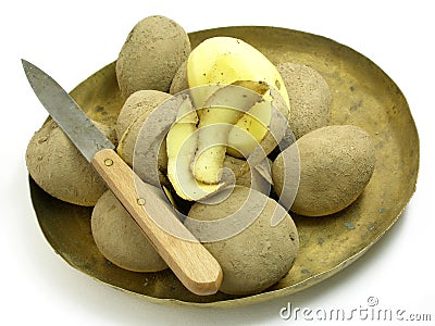 Peeling potatoes 3 Stock Photo
