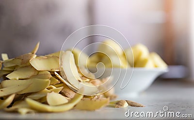 Peeling potatoes Stock Photo