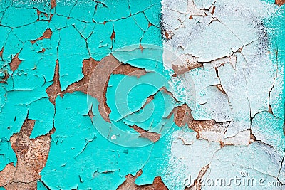 Peeling turquoise paint on a concrete wall. Blue and white painted abstract backgrounds, cracked rusty metal surface, faded Stock Photo