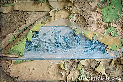 Peeling wallpaper on broken wall Stock Photo