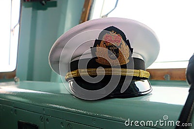 Malaysian Royal Navy office`s hat in KD Jebat command bridge during 85th Malaysian Editorial Stock Photo