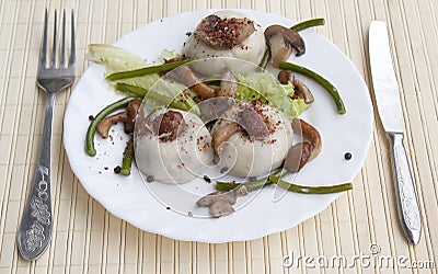 Pelmeni with fungi Stock Photo