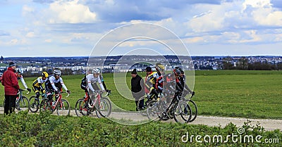 The Peloton on a Dirty Road - Paris-Nice 2016 Editorial Stock Photo