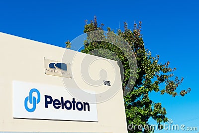 Peloton sign and logo. Peloton Technology is an American automated and connected vehicle technology company Editorial Stock Photo