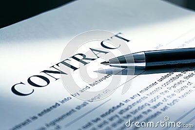 Pen on contract papers Stock Photo