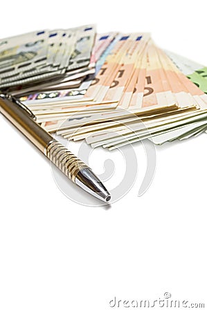 Pen with euro banknotes isolated on white background. Stock Photo