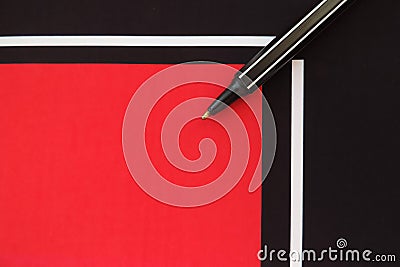 Pen on geometric pattern papers in minimal concept. White, black, orange red stripes squares geometric shapes Stock Photo