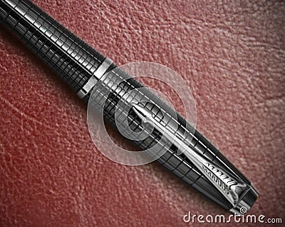 Pen on leather Stock Photo