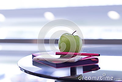 Pen with a Notebook and Phone are on the Table Stock Photo