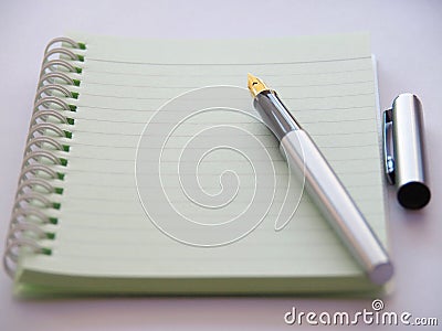 Pen and notebook Stock Photo