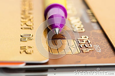 Pen over credit card Editorial Stock Photo