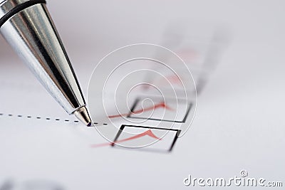 Pen Over Filled Checkboxes Stock Photo