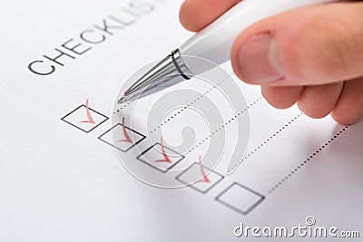 Pen Over Filled Checkboxes Stock Photo