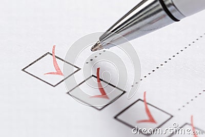 Pen Over Filled Checkboxes Stock Photo